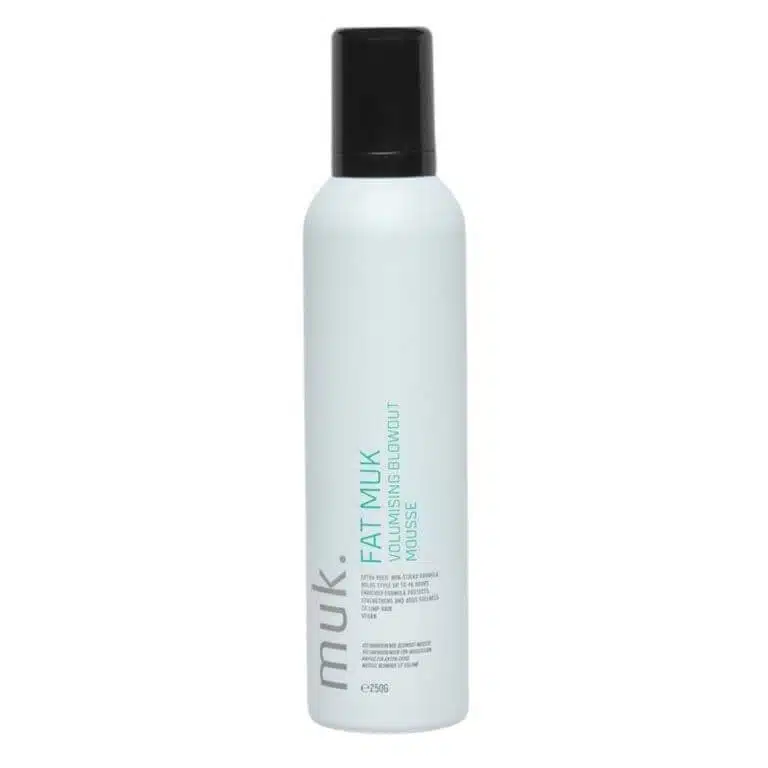 A bottle of tea milk on a white background with Muk - Styling - Fat muk Volumising Blowout Mousse 250g.