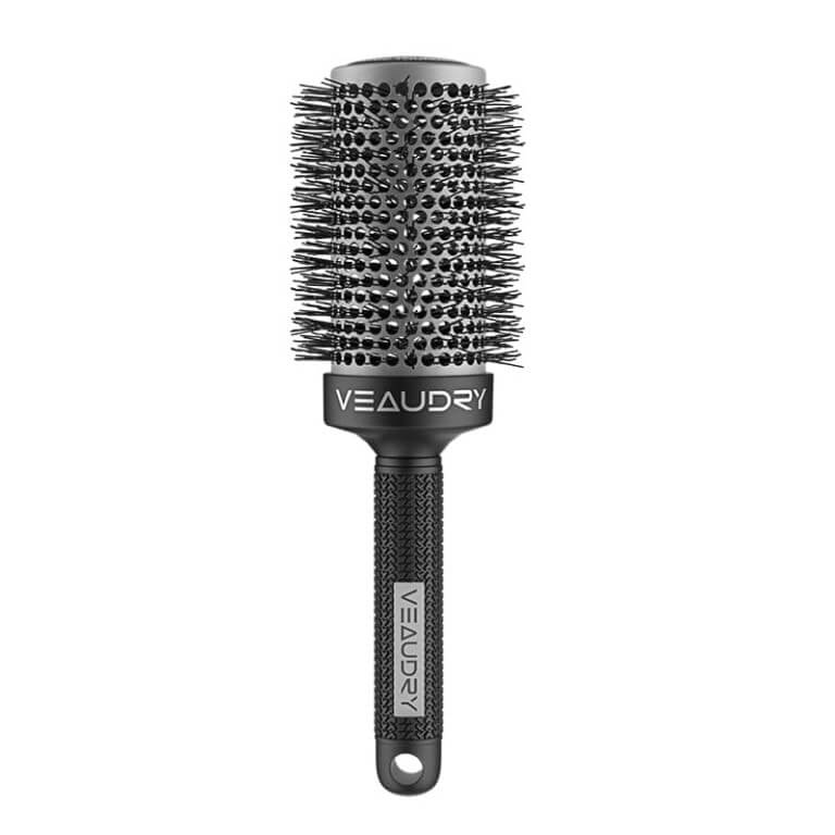 A black veaudry brush on a white background.