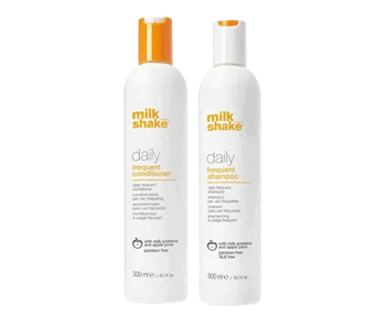 Two bottles of milkshake daily shampoo and conditioner.