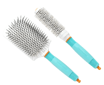 Two hair brushes on a black background.