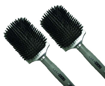 Two ceramax hair brushes on a black background.