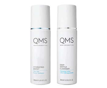 Two bottles of oms skin care products.