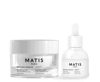 Matis anti-aging cream and a bottle on a white background.