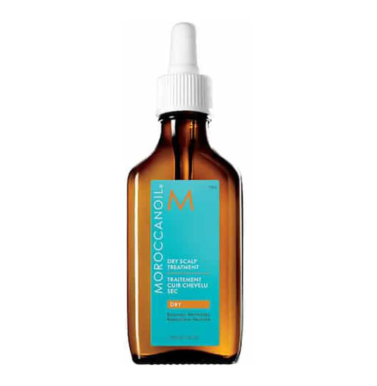 Moroccan oil with a bottle on a white background.