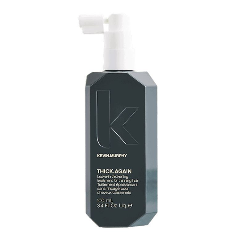 A bottle of kevin kors hairspray on a white background.