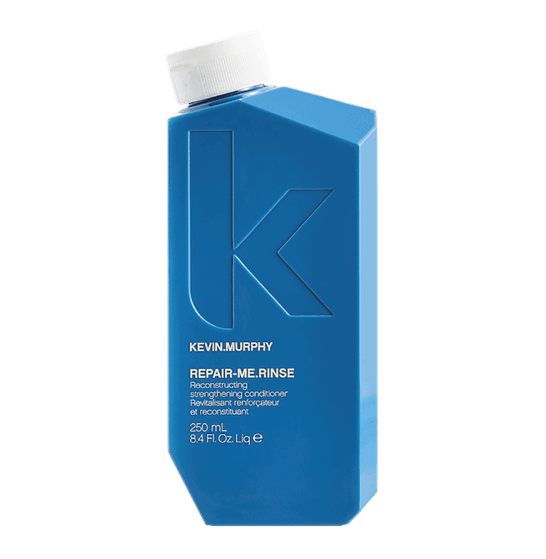 A bottle of kevin mccartney's keratin smoothing shampoo.