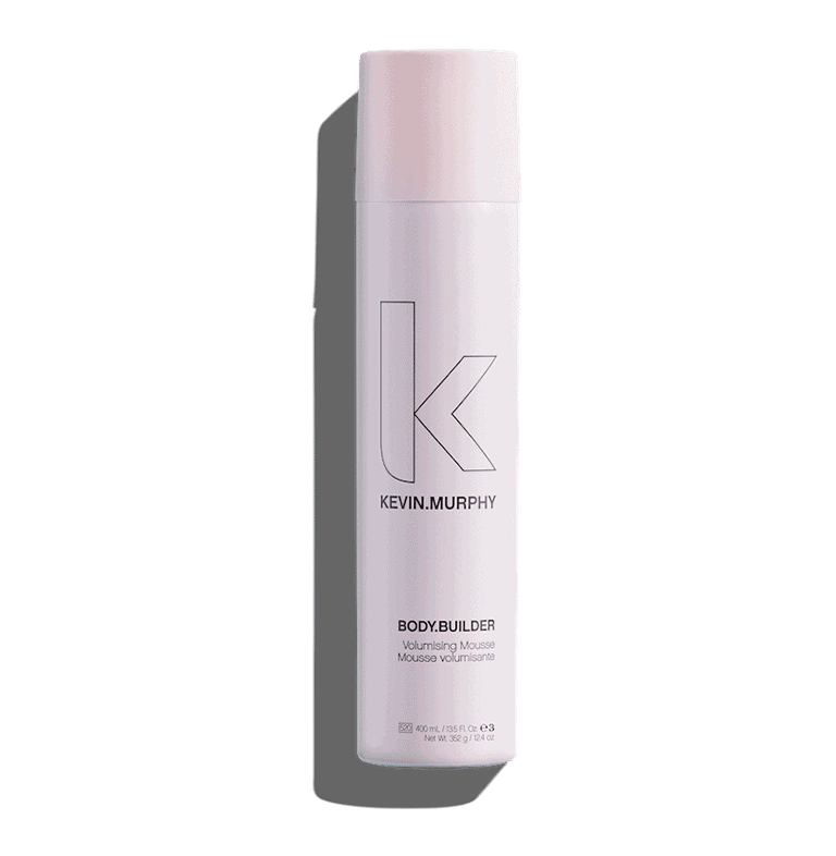 A pink bottle of hairspray on a white background.