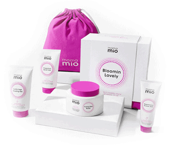 A pink and white cosmetic set with a pink bag.