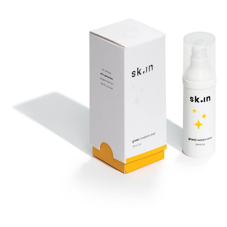 A white box containing a bottle of Vitamin C skin care product.