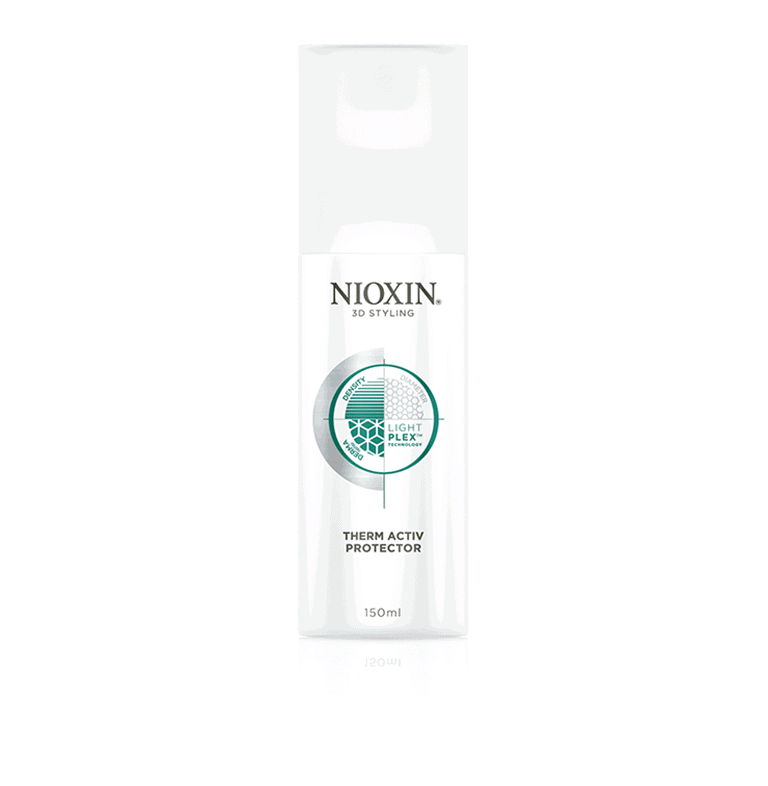 A bottle of nioxin lotion on a white background.