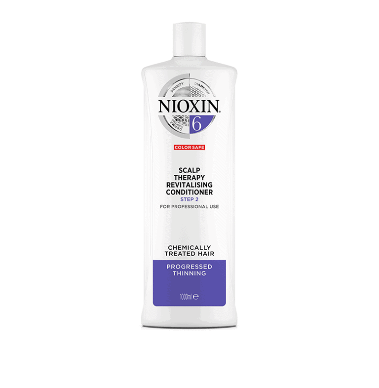 A bottle of nioxin deep conditioning shampoo on a white background.