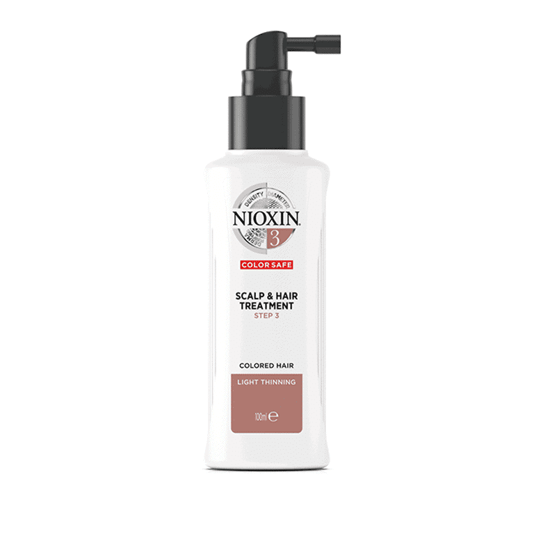 A bottle of nioxin hair and scalp treatment.