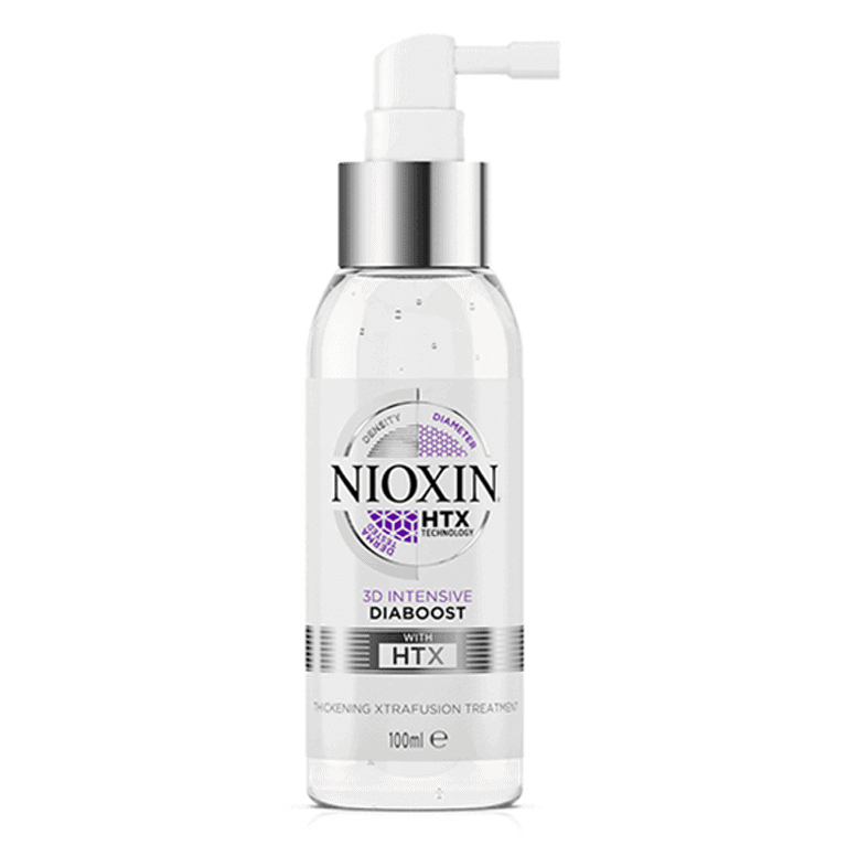 A bottle of nioxin shampoo with a white background.