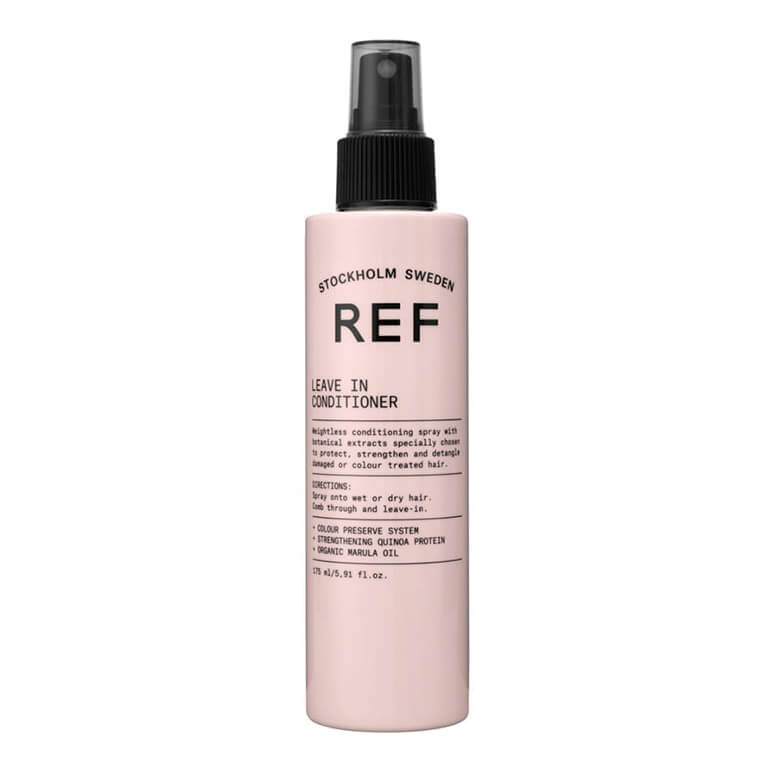 A bottle of ref conditioner with a pink bottle on a white background.