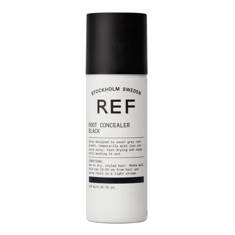 A bottle of ref deodorant on a white background.