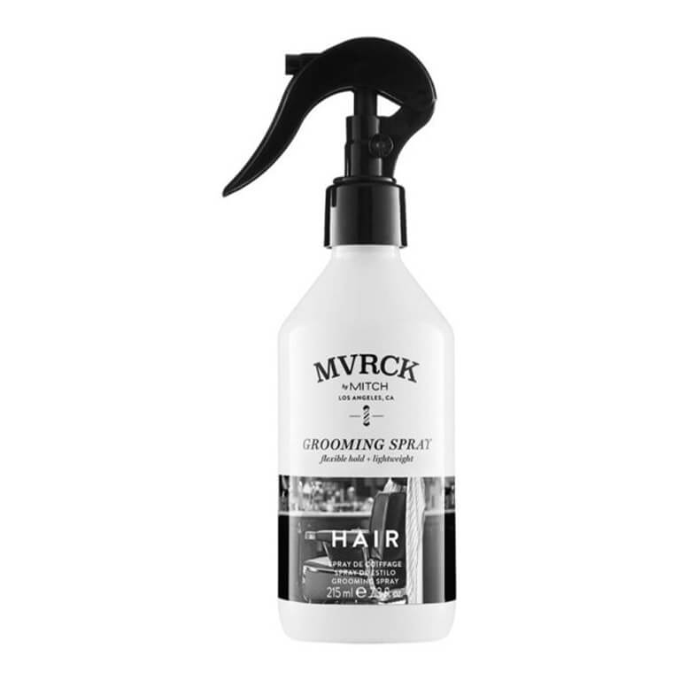 A bottle of myrck hairspray on a white background.