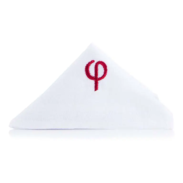 A white napkin with the letter p on it.
