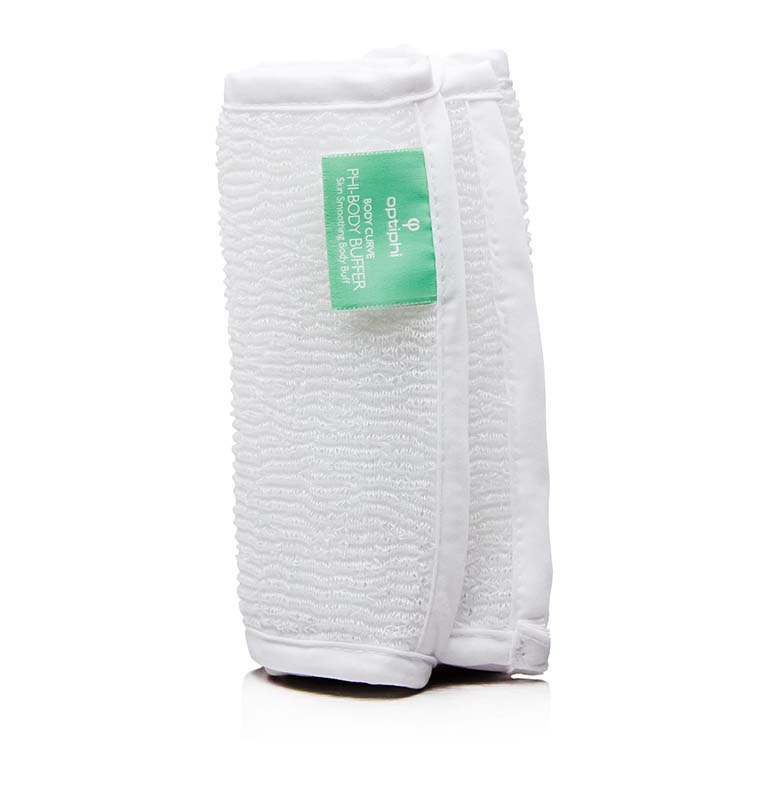 A white towel with a green tag on it.