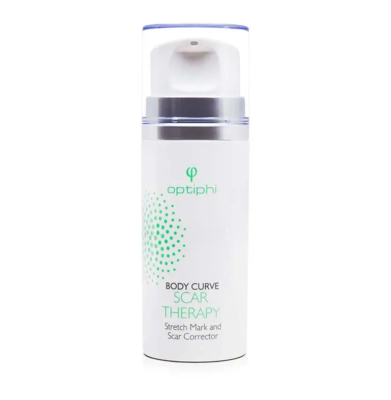 A bottle of body curve therapy for stretch marks on a white background.