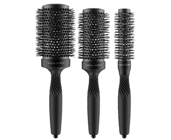 Three veaudry hair brushes on a black background.