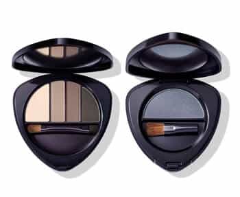 Two Dr. Hauschka eyeshadow palettes with brushes on a white background.
