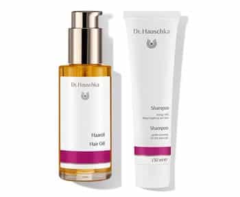 A bottle of Dr Hudson's hydrating body oil and Dr Hauschka.