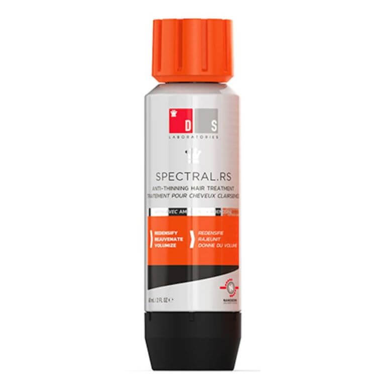 A bottle of orange and black paint on a white background by DS Laboratories.