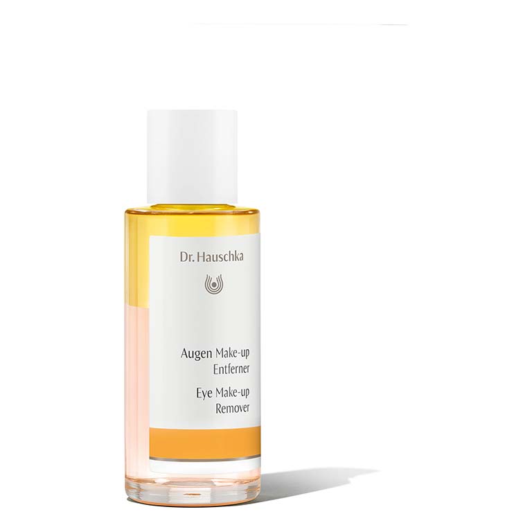 A bottle of Dr.Hauschka's Eye Make-up Remover 75ml on a white background.
