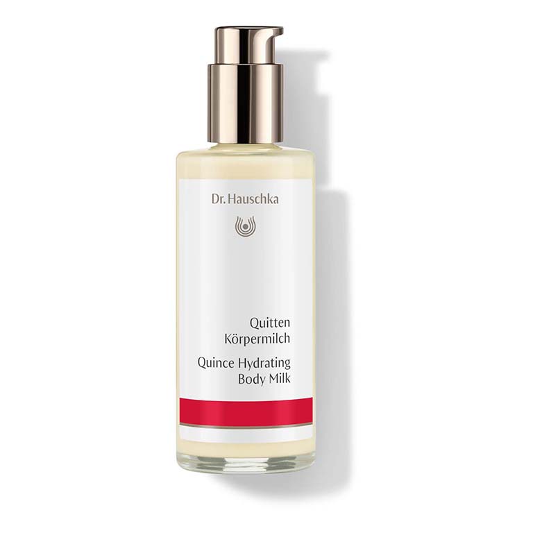 A bottle of Dr.Hauschka - Quince Hydrating Body Milk 145ml, a nourishing body lotion.