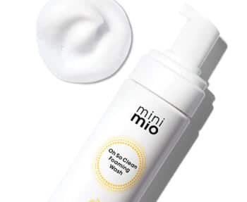 A bottle of mini omo cleansing foam on a white background.