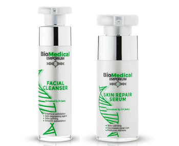 Two bottles of biomedical emporium facial repair cream.