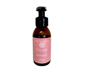 A bottle of body lotion with pink extract on a white background.