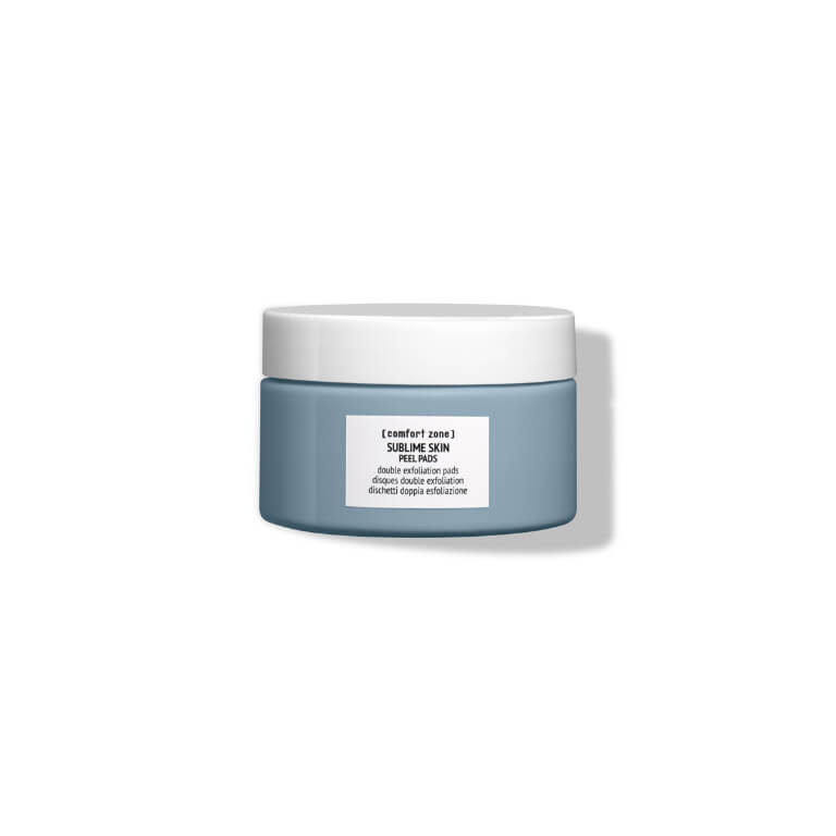 A blue jar with a white lid on a white background, containing Comfort Zone - Sublime Skin Peel Pad 28pcs.