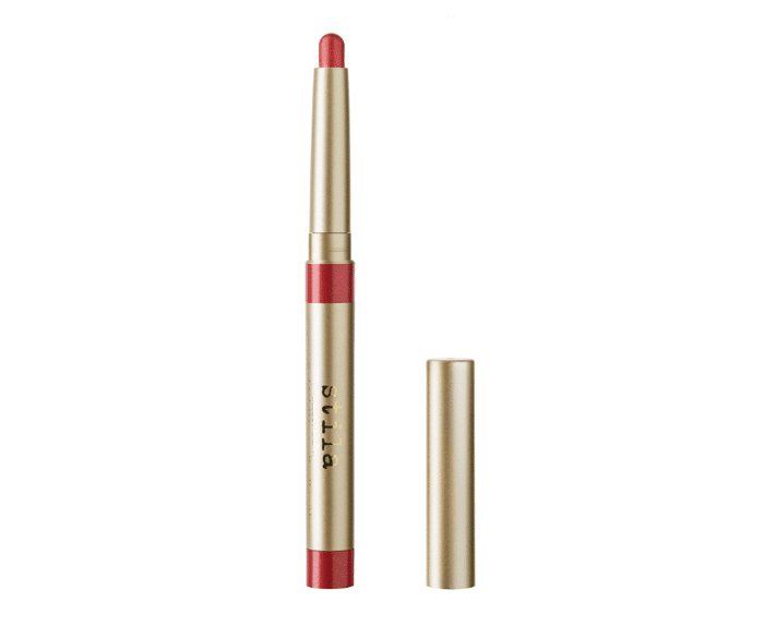 A red lip pencil with a gold tip.