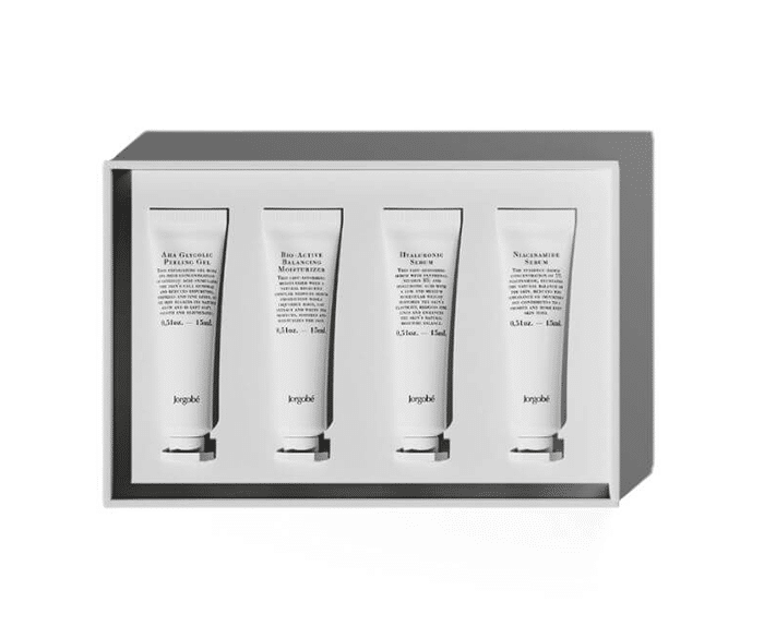 Three tubes of skin care products in a white box.