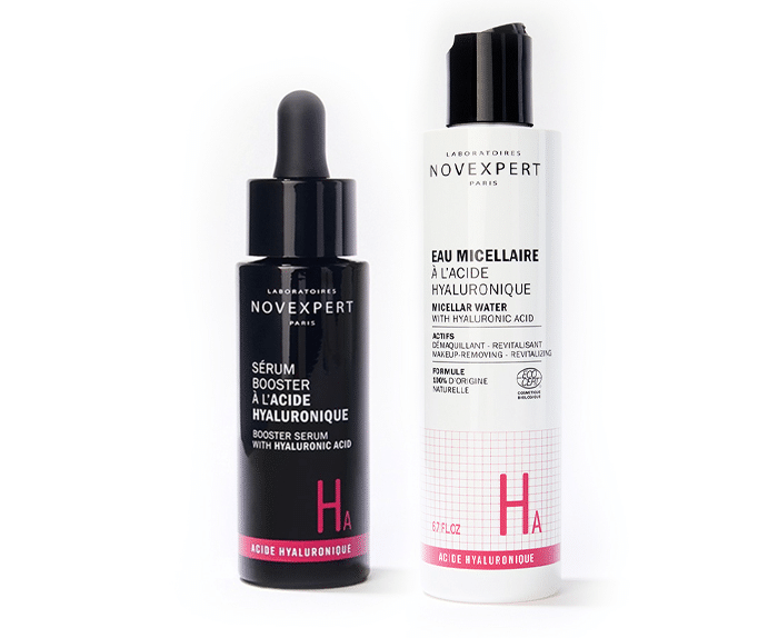 A bottle of h serum and a bottle of h serum.
