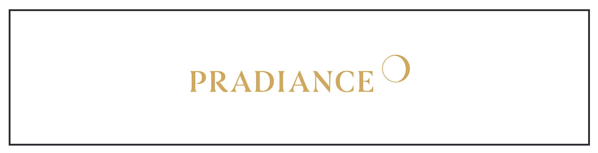 A gold logo with the word prada on it.