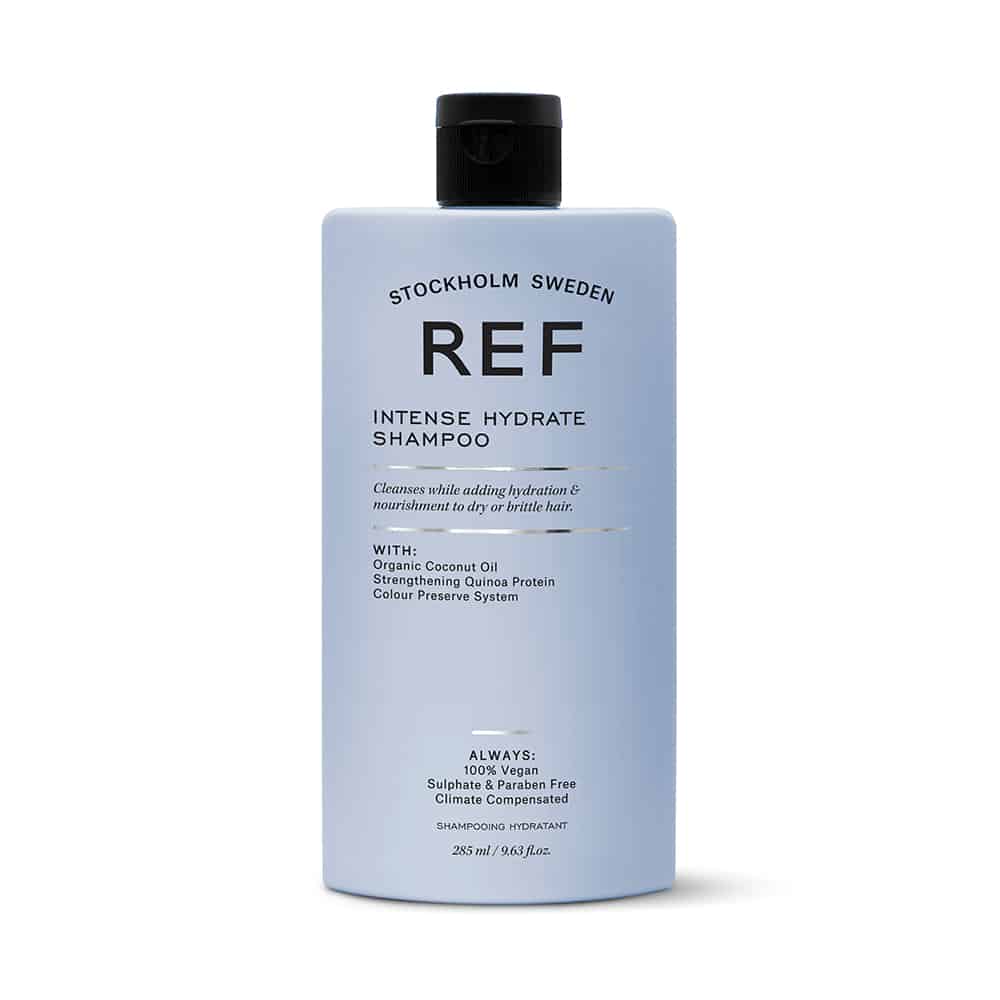 A bottle of ref shampoo on a white background.