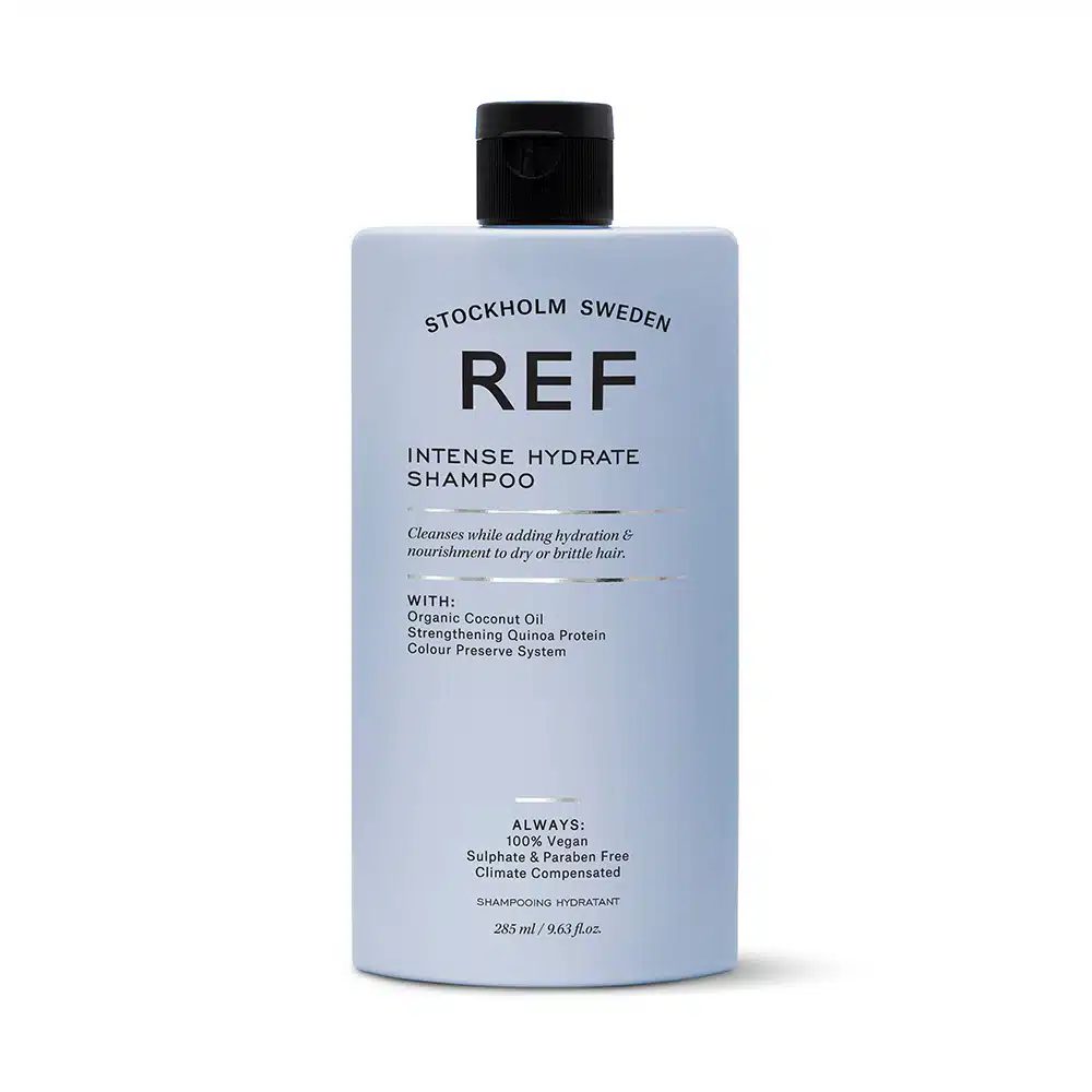 A bottle of ref shampoo on a white background.