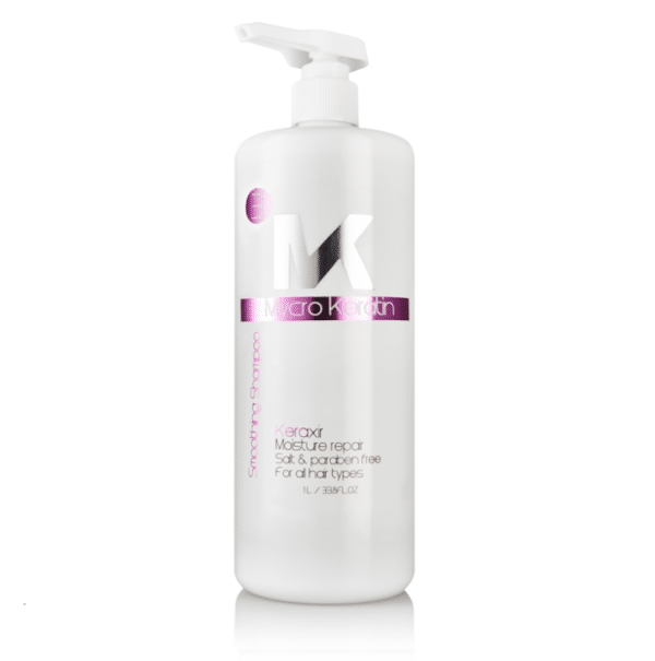 A bottle of MycroKeratin - Smoothing Shampoo Keraxir 1L with a pink bottle on a white background.